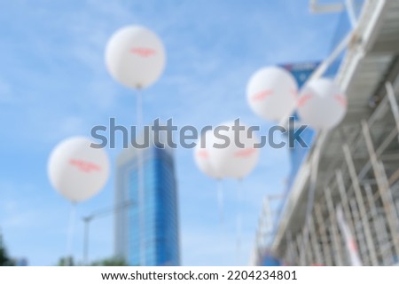 Defocused of white ballons, blurred image of white ballons.