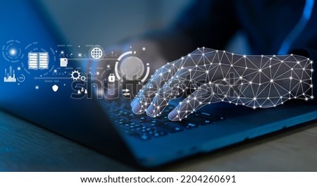 close up on robot hand working on laptop to checking correct data by using RPA function software program to help proof and detect and synchronize to system for future technology of business concept Royalty-Free Stock Photo #2204260691