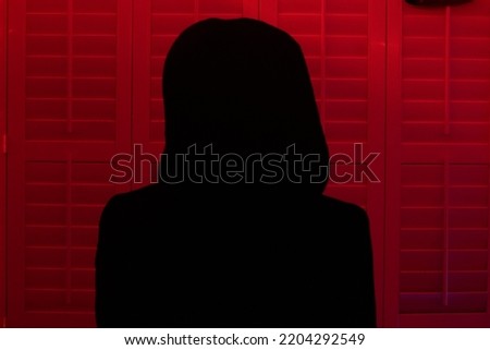 Haunted Halloween silhouette in red 