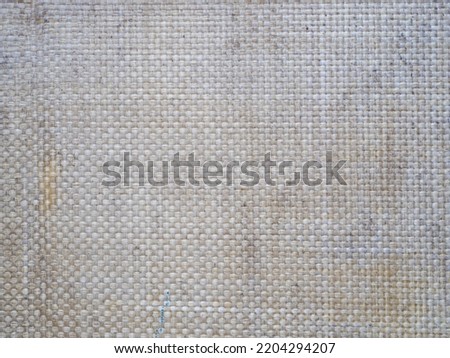Abstract texture background. Gray beige fiberglass cloth background. Design element.