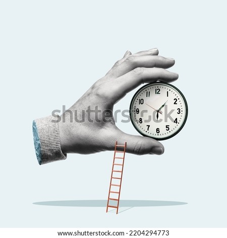 The hand holds a clock, art collage. Royalty-Free Stock Photo #2204294773
