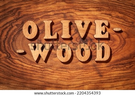 Olive-wood - Inscription by wooden letters close up