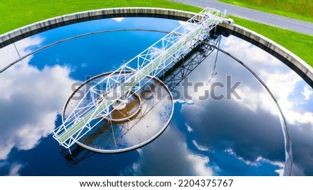Sewage treatment plant from above. Grey water recycling. Waste management theme. Ecology and environment in European Union. Royalty-Free Stock Photo #2204375767