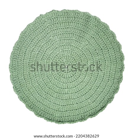 Round colored knit. Traditional round knit rug handmade. Isolated on a white background. 