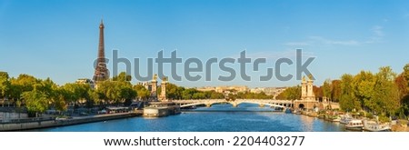 Morning sunlight panorama of Pont Alexandre III bridge with Eiffel Tower in the background in Paris. France