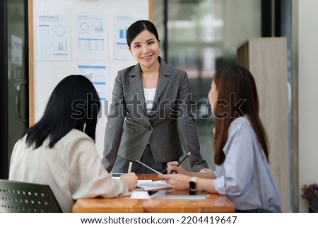 Financial Analyst discussing with Investment Banker at Meeting Room. Fund investment concept