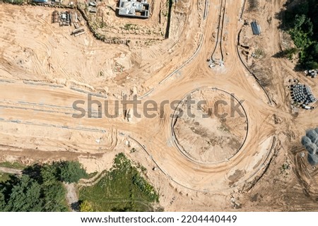 road construction. building road intersection. roundabout. aerial top view. Royalty-Free Stock Photo #2204440449