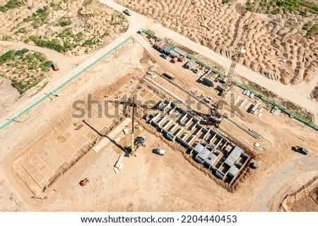 construction of concrete foundation for new apartment building. aerial view.