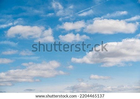 white cloud on blue sky. some white whispy clouds and blue sky cloudscape. Beautiful blue sky and clouds natural background. Blue sky and white fluffy clouds