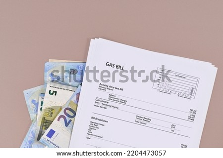 Gas bill document with euro bills