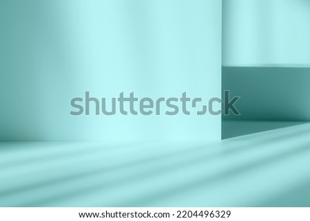 Abstract turquoise studio background for product presentation. Empty blue room with shadows of window. Display product with blurred backdrop.