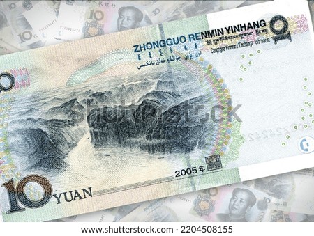 Background of 10 Chinese yuan banknote,Group of money stack of 10 yuan banknote a lot of the background texture, top view