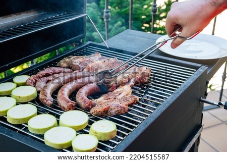 pictures of barbecue meat, ribs and sausage with vegetables