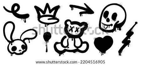 Set of black graffiti spray pattern. Collection of symbols, heart, crown, arrows, rabbit, bear, skull with spray texture. Elements on white background for banner, decoration, street art and ads.