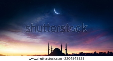 Mosque sunset sky, moon, holy night, islamic night and silhouette mosque, panaromic islamic wallpaper Royalty-Free Stock Photo #2204543525