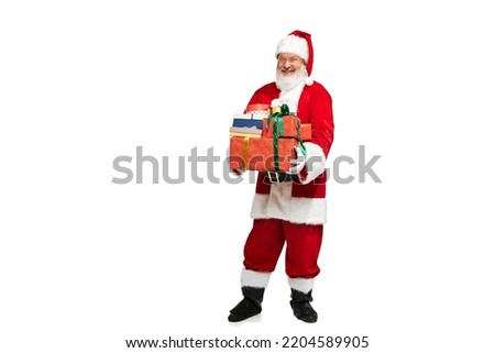 Portrait of senior man in image of Santa Claus with present box isolated over white background. Holiday surprise . Concept of fictional character, holiday, New Year, Christmas. Copy space for ad