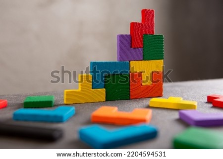 Creative idea solution - business concept, jigsaw puzzle close up. Leadership and teamwork strategy success. Royalty-Free Stock Photo #2204594531