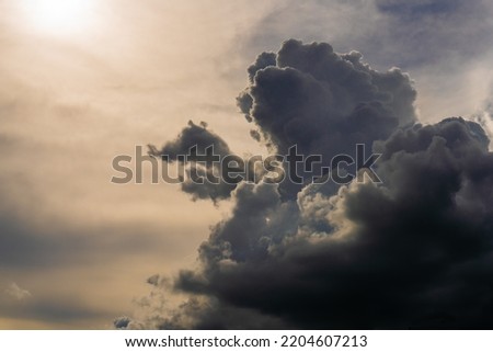 Black clouds before the storm and the rain, big white clouds in the blue sky, Nimbostratus clouds, an altostratus cloud
 Royalty-Free Stock Photo #2204607213