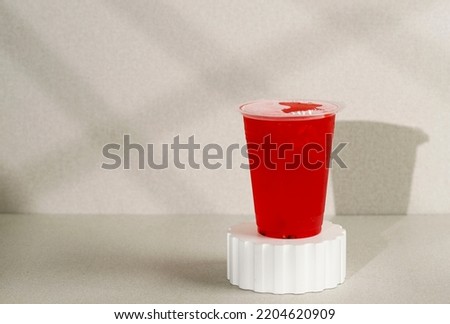 Watermelon Juice on Plastic Cup, Fresh Drink To Go. Concept. Copy Space for Text