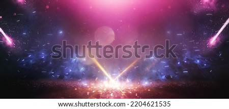 background of abstract blue, pink, purple and gold glitter lights. defocused