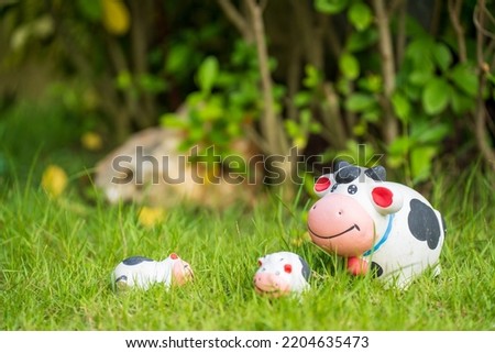 Grassland cow simulation doll background image
