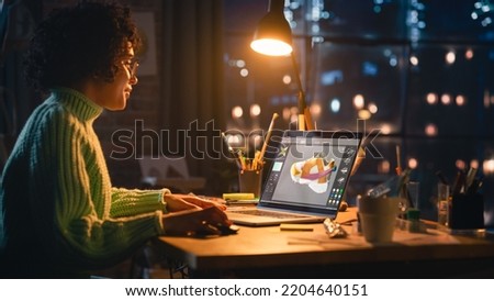 Latina Female Designer Working on Laptop, Screen Showing Editing Software with 3D Model of a Shoe. Concentrated Woman Creating Her Own Project, Using Modelling Technology on Computer. Royalty-Free Stock Photo #2204640151