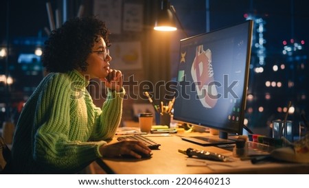 Black Female Art Director Reviewing 3d Model of Shoe, Working on Powerful Desktop Computer at Home. Artist Girl Making Visualisation in Special Software. Graphic Designer Concept. Royalty-Free Stock Photo #2204640213