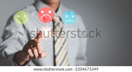 Customer Experience dissatisfied Concept, Unhappy man customer giving sadness emotion face on online survey, Bad review, bad service dislike bad quality, low rating, social media not good. Royalty-Free Stock Photo #2204673349