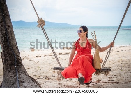 Portrait of beautiful woman having fun on the beach in summer with creative blur.soft focus