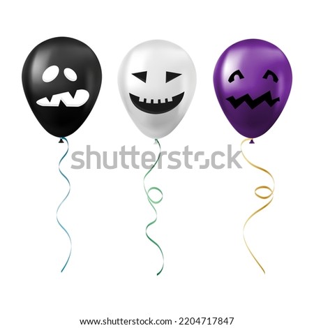 Set of Halloween black, white and purple balloons with scary and funny faces
