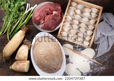Image of making process of Chinese traditional food - dumplings.Step-by-step instructions for cooking dumplings.