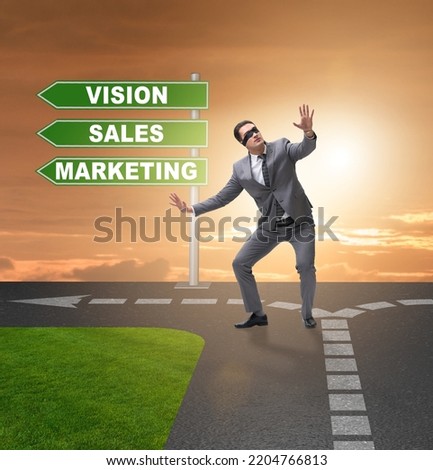 Businessman standing at crossroads of corporate strategy