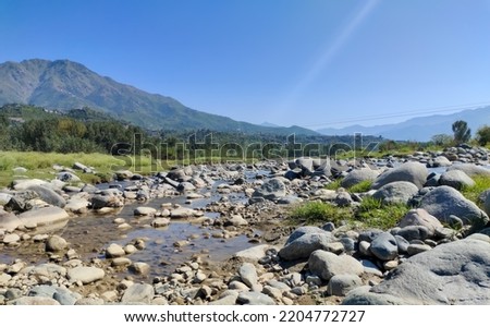 Landscape image of lower dir pakistan .The view point is kamar kotki river. 15 oct 2021. Royalty-Free Stock Photo #2204772727