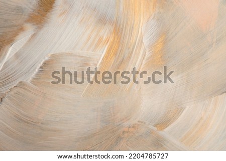 Art modern oil and acrylic smear blot canvas painting wall. Abstract texture gold, bronze, beige and white color stain brushstroke texture background. Royalty-Free Stock Photo #2204785727