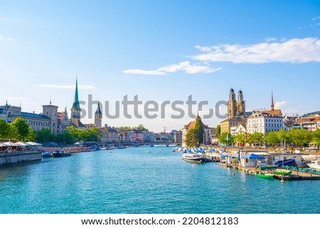 Scenic panoramic view of historic Zürich city center and river Limmat at Lake Zurich on a beautiful sunny day with blue sky in summer, Switzerland Royalty-Free Stock Photo #2204812183