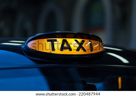 Closeup to a London Taxi Sign