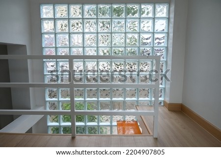 wooden floor with glass block wall, interior design