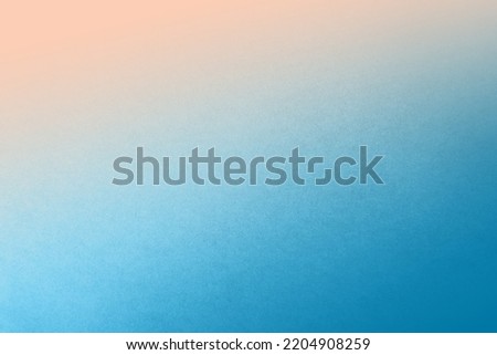Light blue sky two tone color gradation with pale soft orange paint on recycled cardboard box blank paper material and texture isolated background with minimalism style space Royalty-Free Stock Photo #2204908259