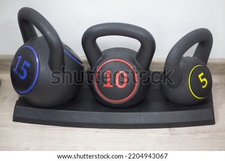 Kettlebells in the gym fitness room