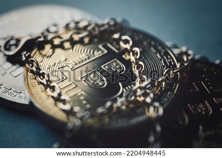 golden chain and virtual currency bitcoin Royalty-Free Stock Photo #2204948445