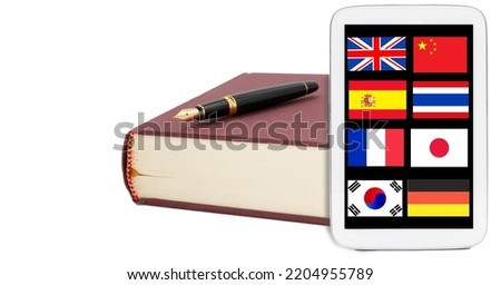 isolated book, pen and tablet with nation flags on white background represent translation service or study international languages 