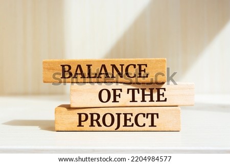 Wooden blocks with words 'Balance Of the Project'. Business concept