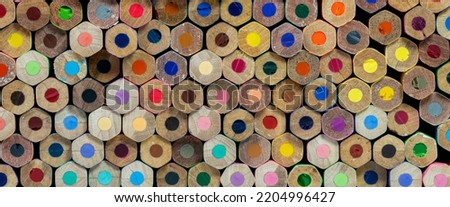 Set of stacked color pencils, Close-up shot showing different colors as a background, Background concept, Education concept