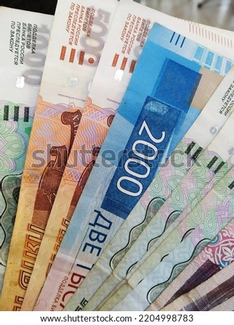 Russian rubles. Currency of the Russian Federation. Lots of money on the table. Russian economy.