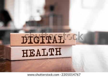 Wooden blocks with words 'digital health'.