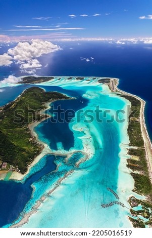 Aerial view of Bora Bora French Polynesia an Atoll in the Pacific Ocean luxury vacation Island tropical resort travel tourism South Pacific