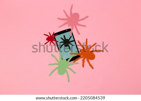 spiders on mobile phone, creative halloween concept, paper craft