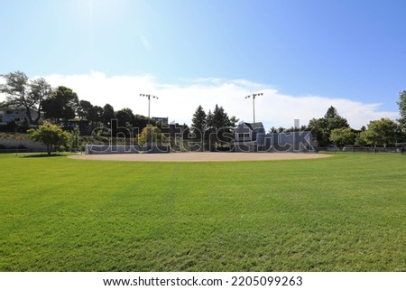 The baseball diamond in Bayfront Park in downtown Petoskey, Michigan. Royalty-Free Stock Photo #2205099263