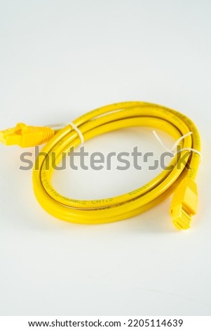 yellow network cable isolated white background