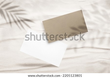  business card moukup paper.Square Paper Mockup with realistic shadows overlays leaf. Shadow Of A Tropical Plant.